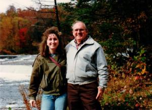The author and her father at a river fishing spot in the late 1980's