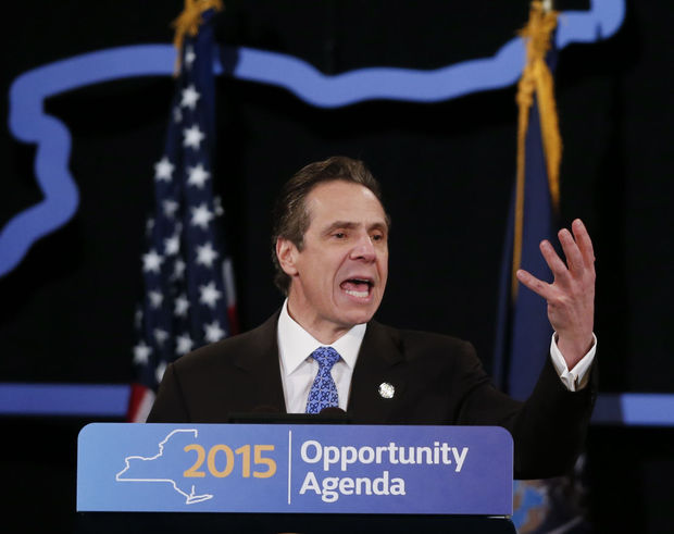 New York Gov. Andrew Cuomo delivers his State of the State address and executive budget proposal at the Empire State Plaza Convention Center on Wednesday, Jan. 21, 2015, in Albany, N.Y. (AP Photo/Mike Groll)
